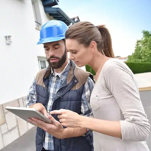 Field service technician completing a digital work order on a tablet
